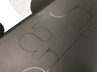 Vernis sélectif sur dépliant pelliculé