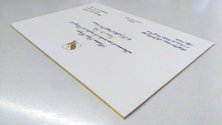 Dorure sur tranche sur faire-part de mariage avec encre UV dorée