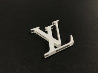 Découpe de logo dans du PMMA teinté blanc