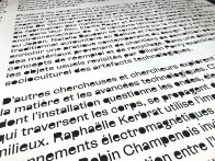 Adhesive lettering in progress : each center of each letter is manually taken away !